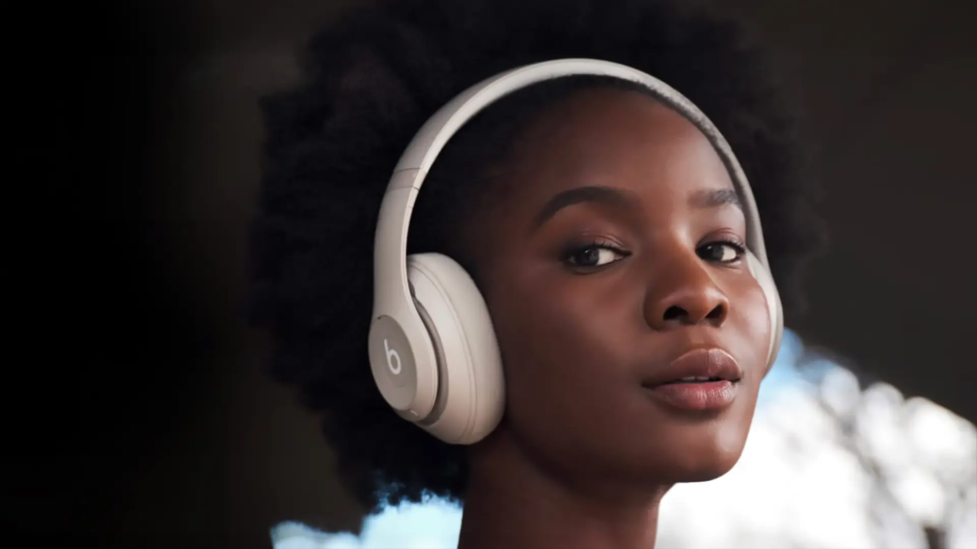 beats studio pro review wireless bluetooth headset showing woman wearing white version